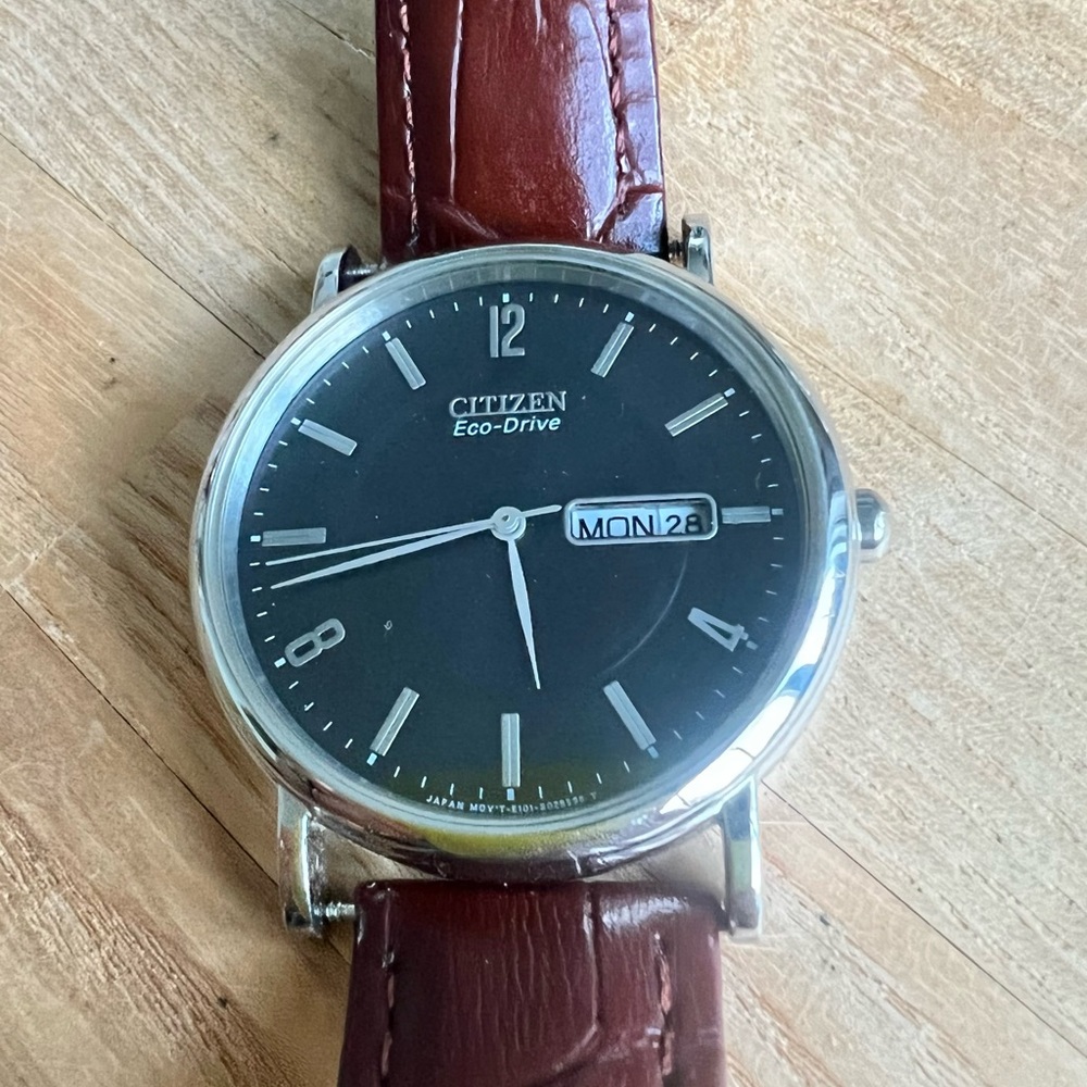 Citizen eco-drive black dial silver tone brown leather dress watch